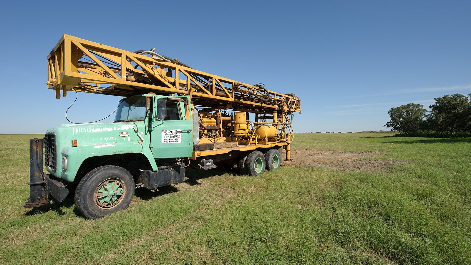Water well drilling truck preparing to set up for a domestic well